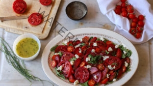 Tomato, Plum, and Arugula Salad with Ricotta and a Chive Vinaigrette