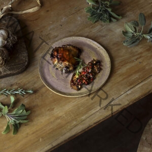 Chicken with Honey, Garlic, Rosemary, and Sage. Served with Sauteed Mushrooms, Chili Pepper, and Garlic