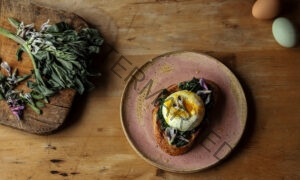 Heirloom Egg and Fava Tendril on Sourdough Toast with Olive Oil